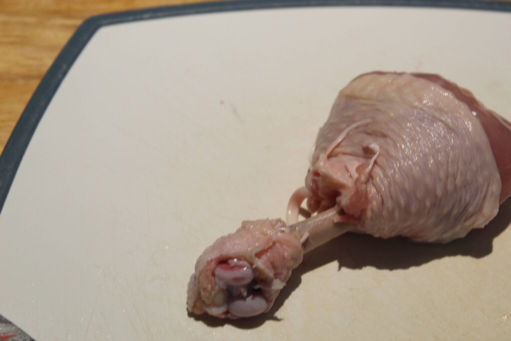 cut meat off chicken drumstick end