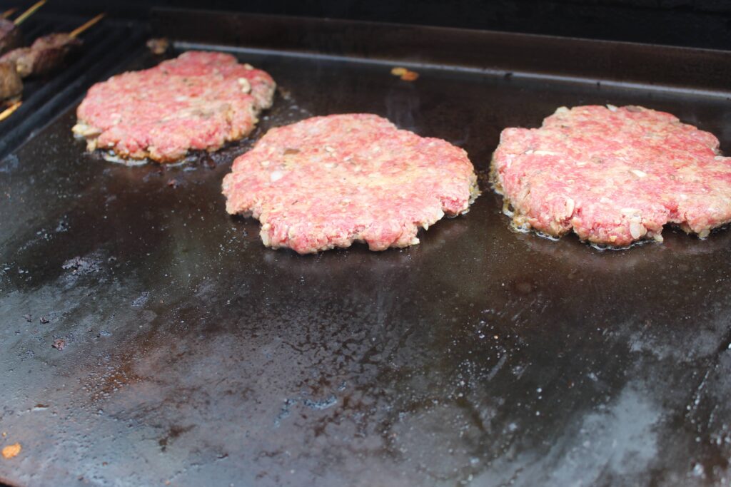 smashed burger on grill