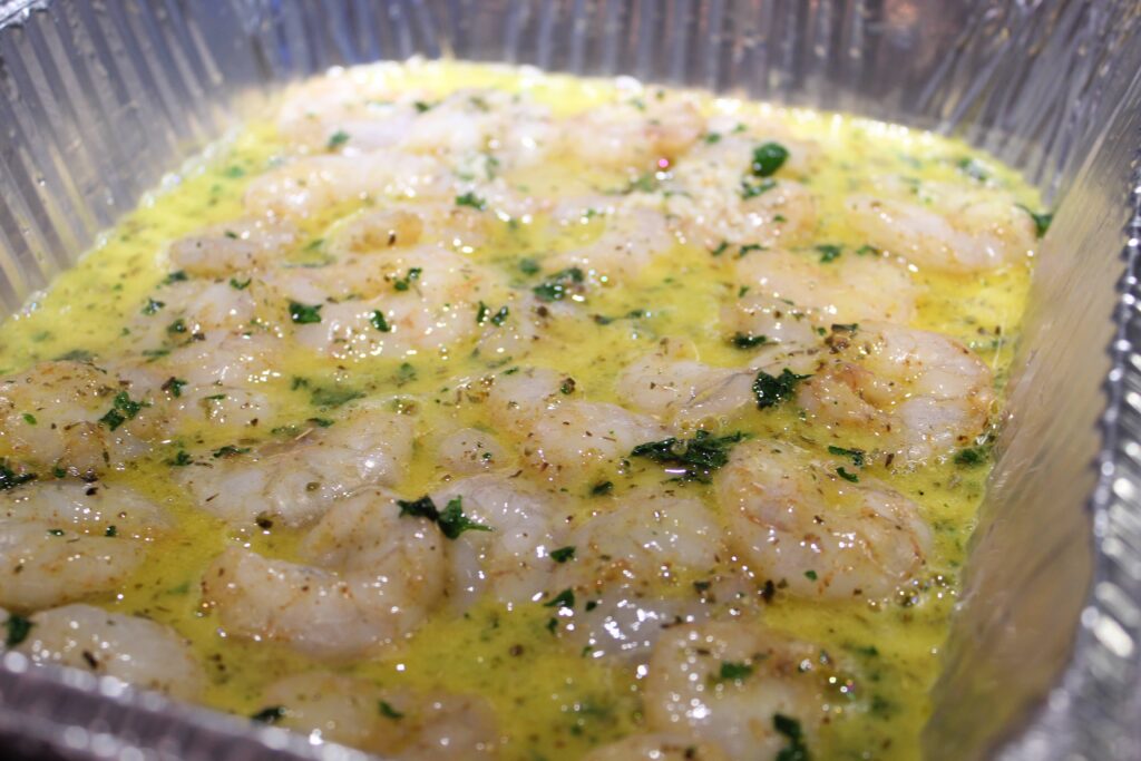 ShrimpBeforeSmoker garlic butter and shrimp in pan